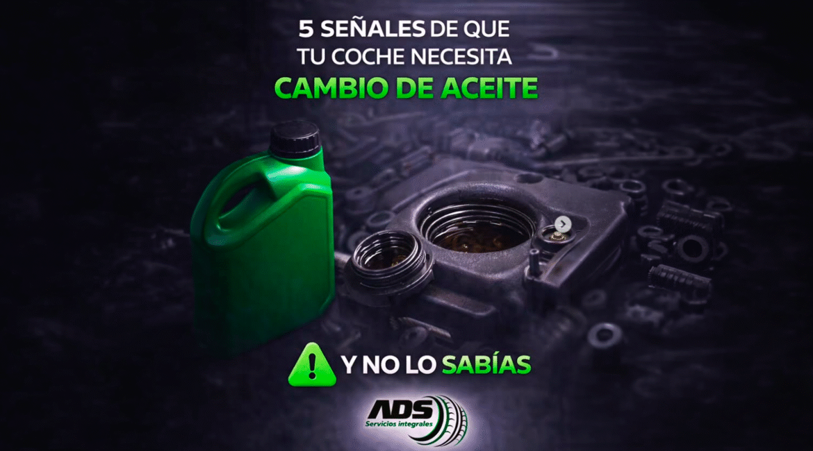 Mecánico realizando cambio de aceite a un coche en taller de Noblejas