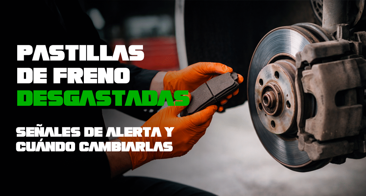 Mecánico revisando pastillas de freno con guantes naranjas en taller mecánico de Noblejas